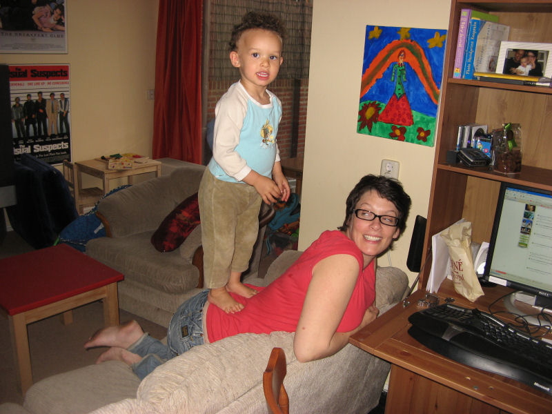 2007 04 25 Ruby does a "ta-da" on Mama's back